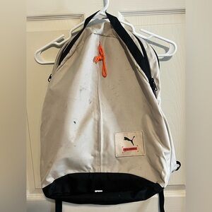 Puma Cream and Black Backpack needs to be spot treated